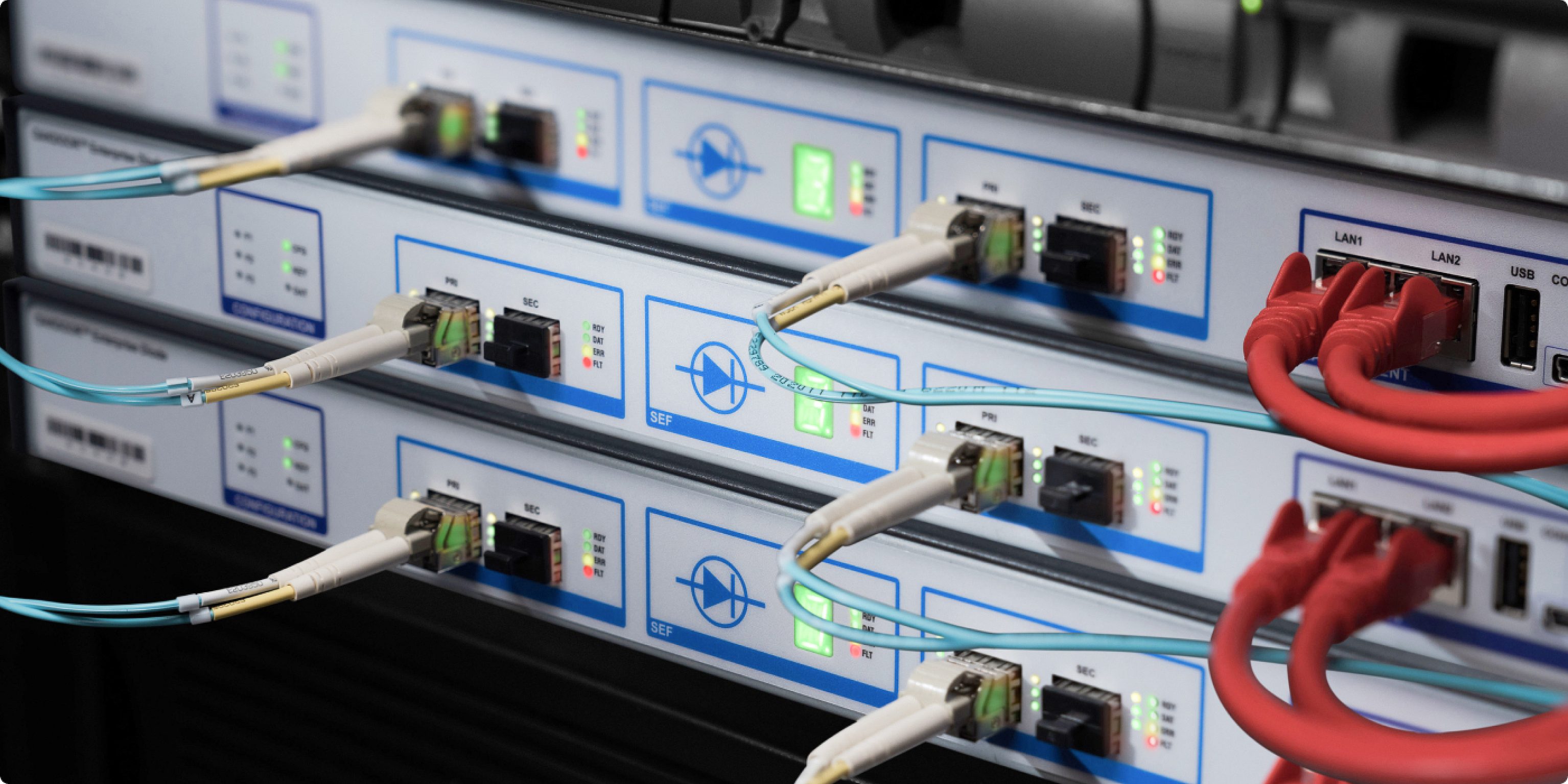 A rack with three Oakdoor Enterprise Diodes atop each other.